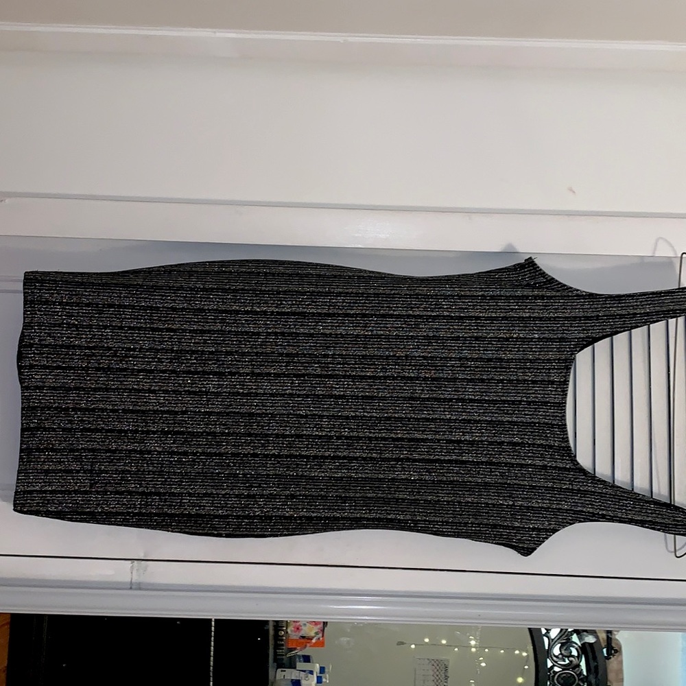 An all black dress with some silver shine! Perfect for a Night out in the City.